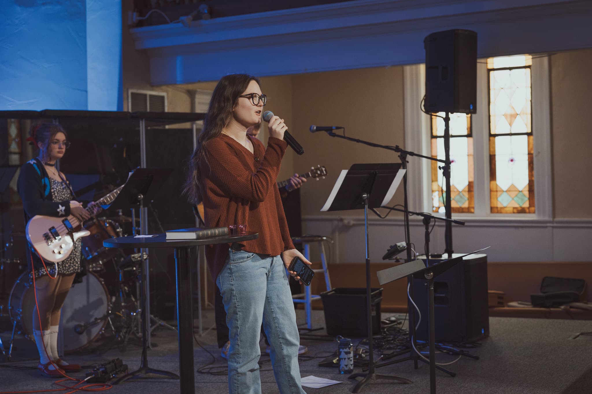 A River City Church leader speaking from the front during a Sunday gathering